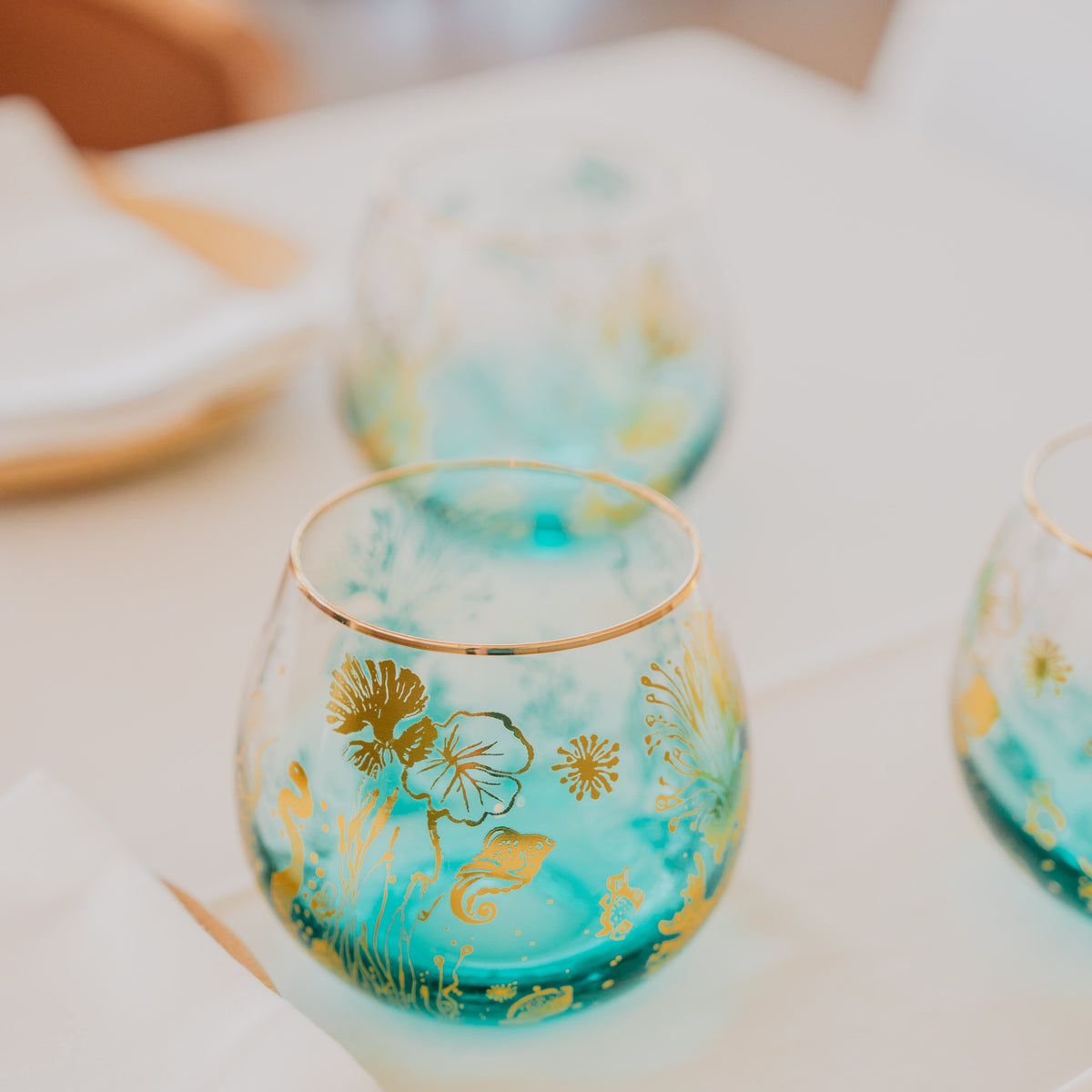 A close-up of the beautiful and elegant stemless wine glass on your dining table. 